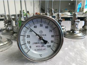 双金属温度计，工业生产中重要的温度测量装置。